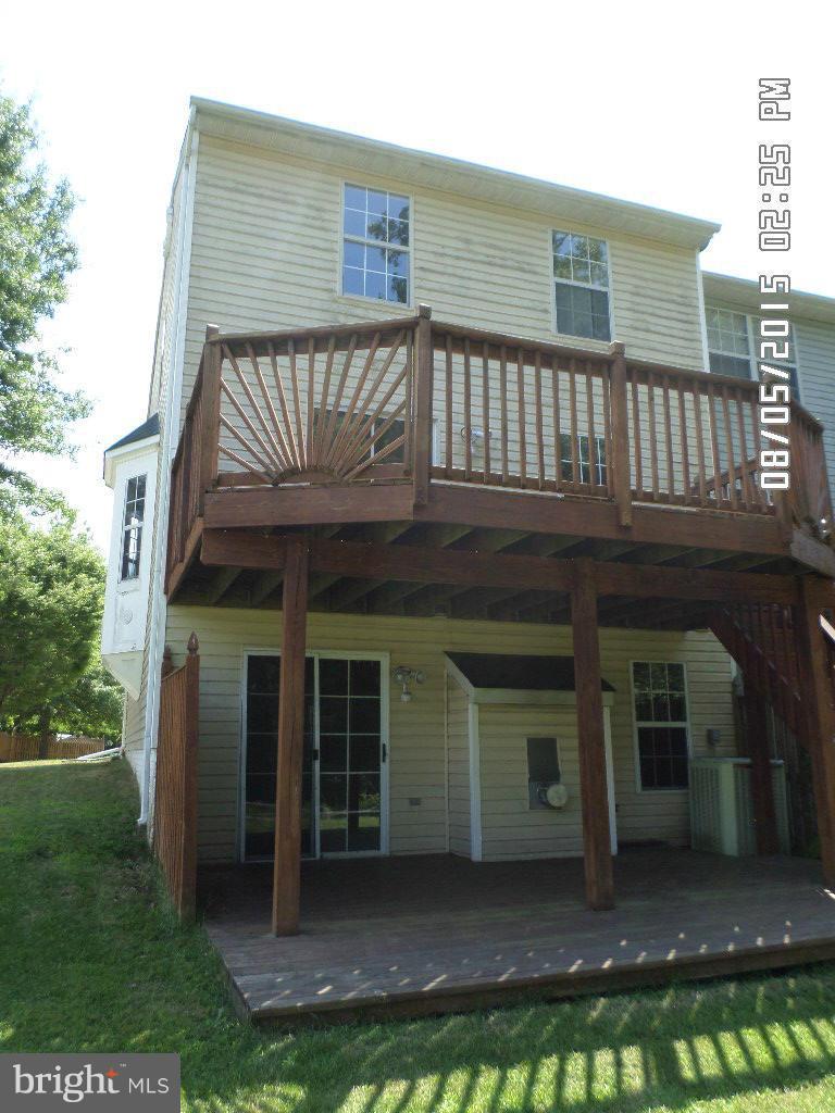 3520 Corn Stream Road Randallstown, MD 21133 - Photo 16 of 16 a front view of a house with a garden