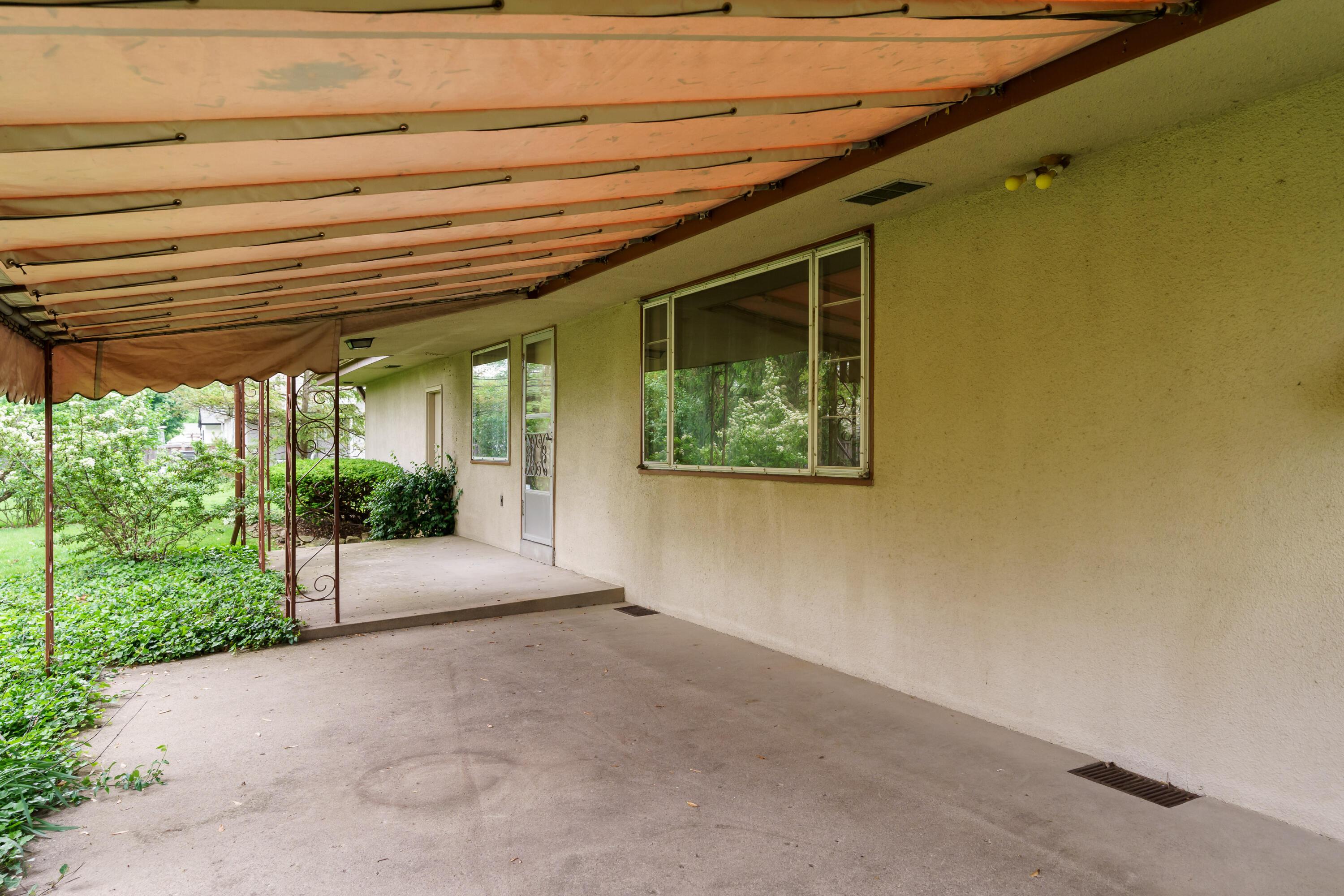 3885 Chevington Road Columbus, OH 43220 - Photo 31 of 34 Covered Patio with Back Entrace Door