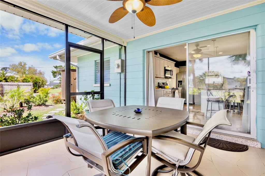 223 Roberts Road Nokomis, FL 34275 - Photo 10 of 27 a view of a dining room with furniture window and outside view