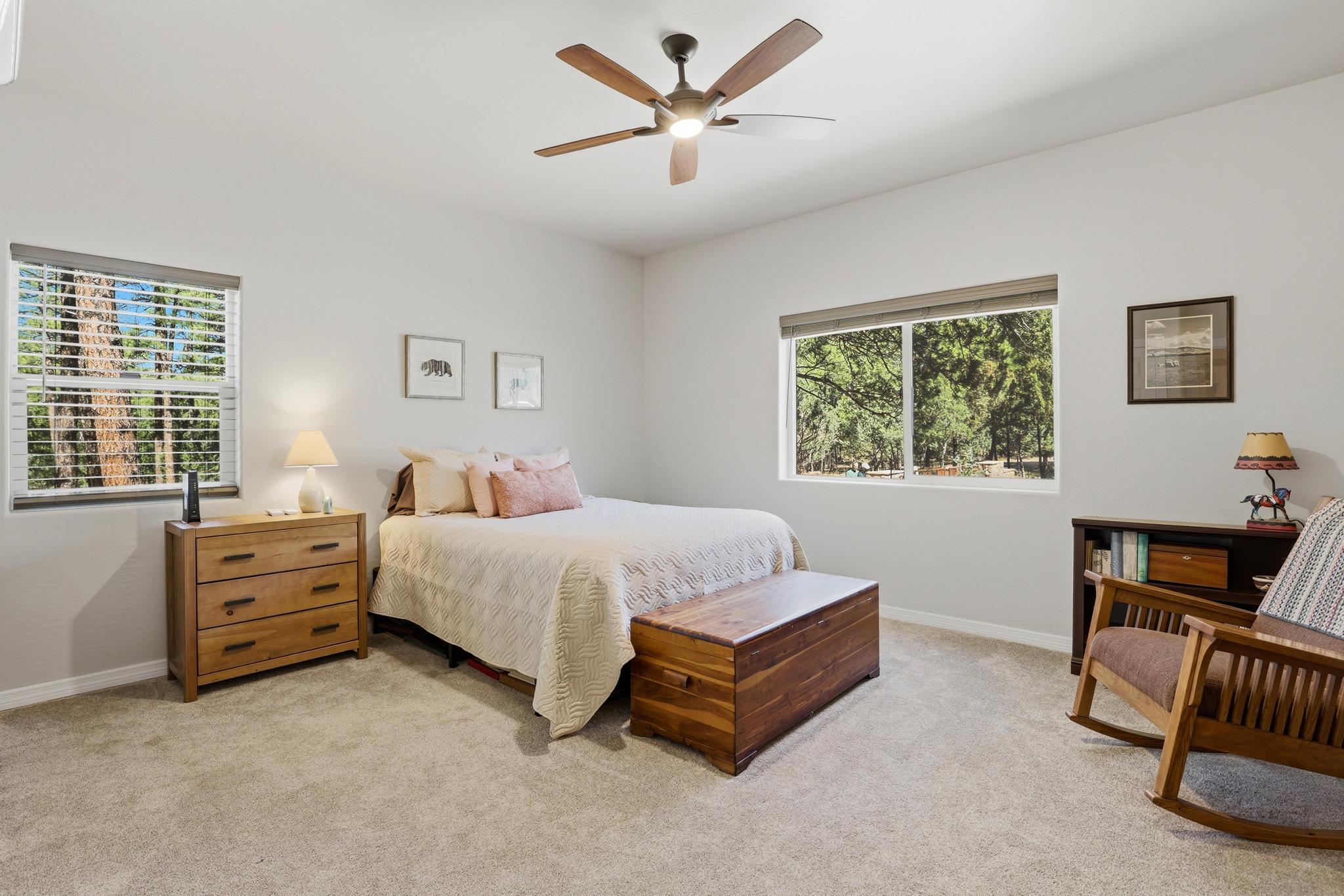5501 Solitude Trail Loop Pine, AZ 85544 - Photo 15 of 27 a spacious bedroom with a bed and a window