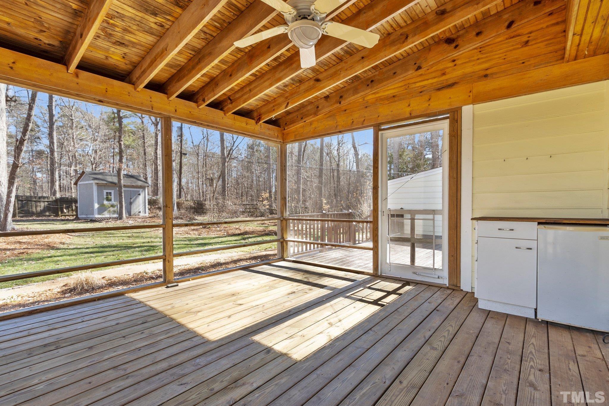 5216 Hallmark Road Durham, NC 27712 - Photo 17 of 24 a view of empty room with wooden floor and fan