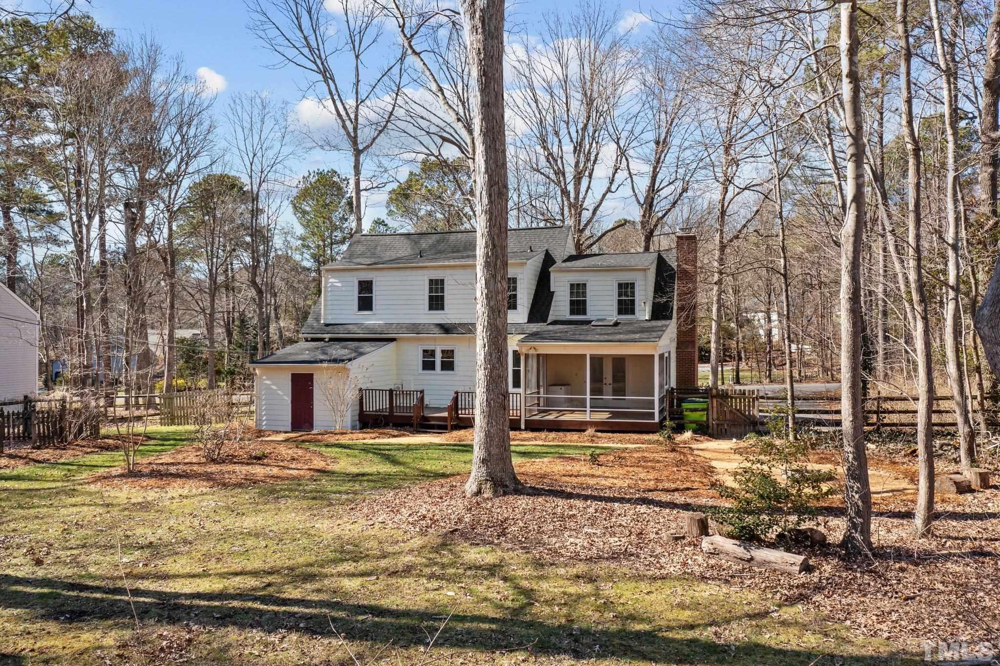 5216 Hallmark Road Durham, NC 27712 - Photo 19 of 24 a front view of a house with a yard