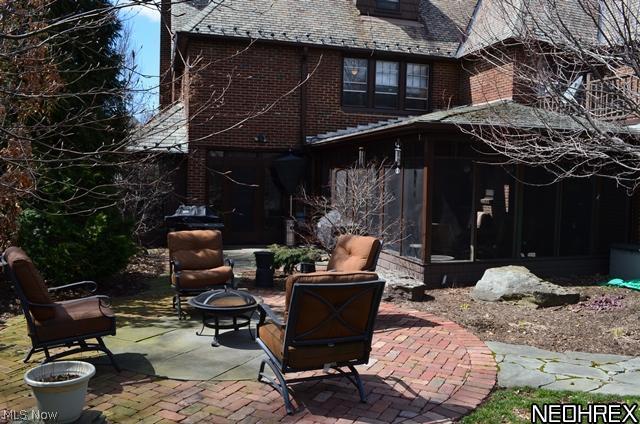 3003 Eaton Road Shaker Heights, OH 44122 - Photo 23 of 25 Rear view of house with patio's and screened porch.