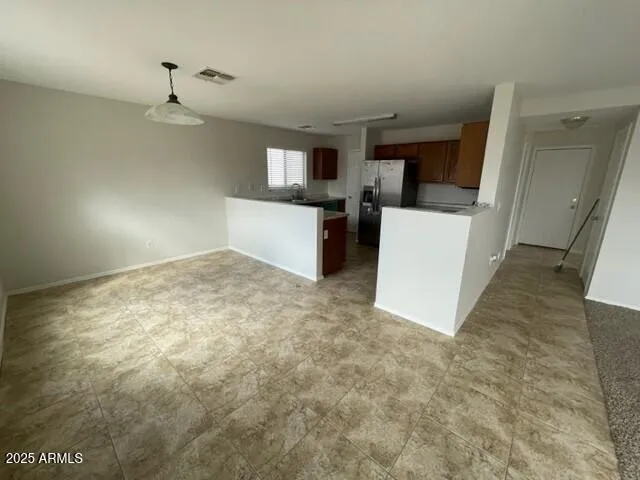 a view of kitchen and a sink