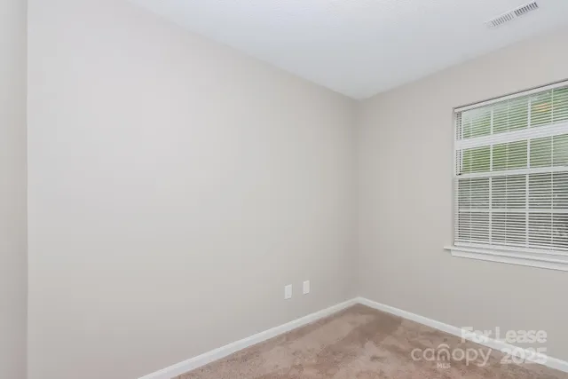 a view of a small space with window