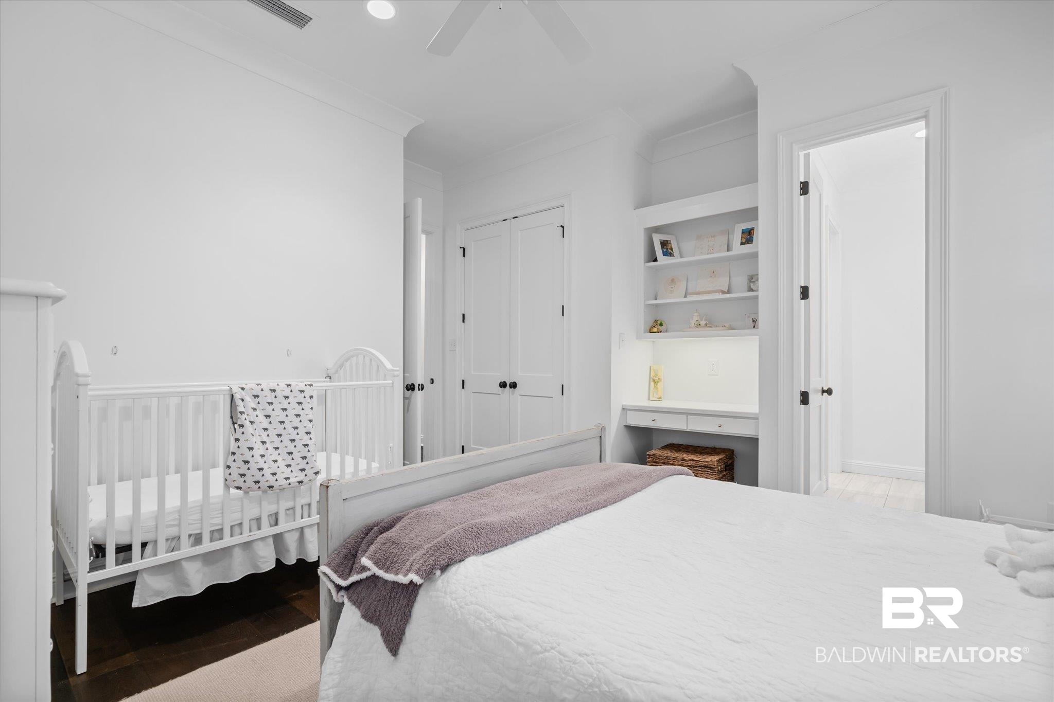 3713 Old Shell Road Mobile, AL 36608 - Photo 29 of 52 Bedroom featuring ceiling fan, a closet, crown molding, and light hardwood / wood-style flooring