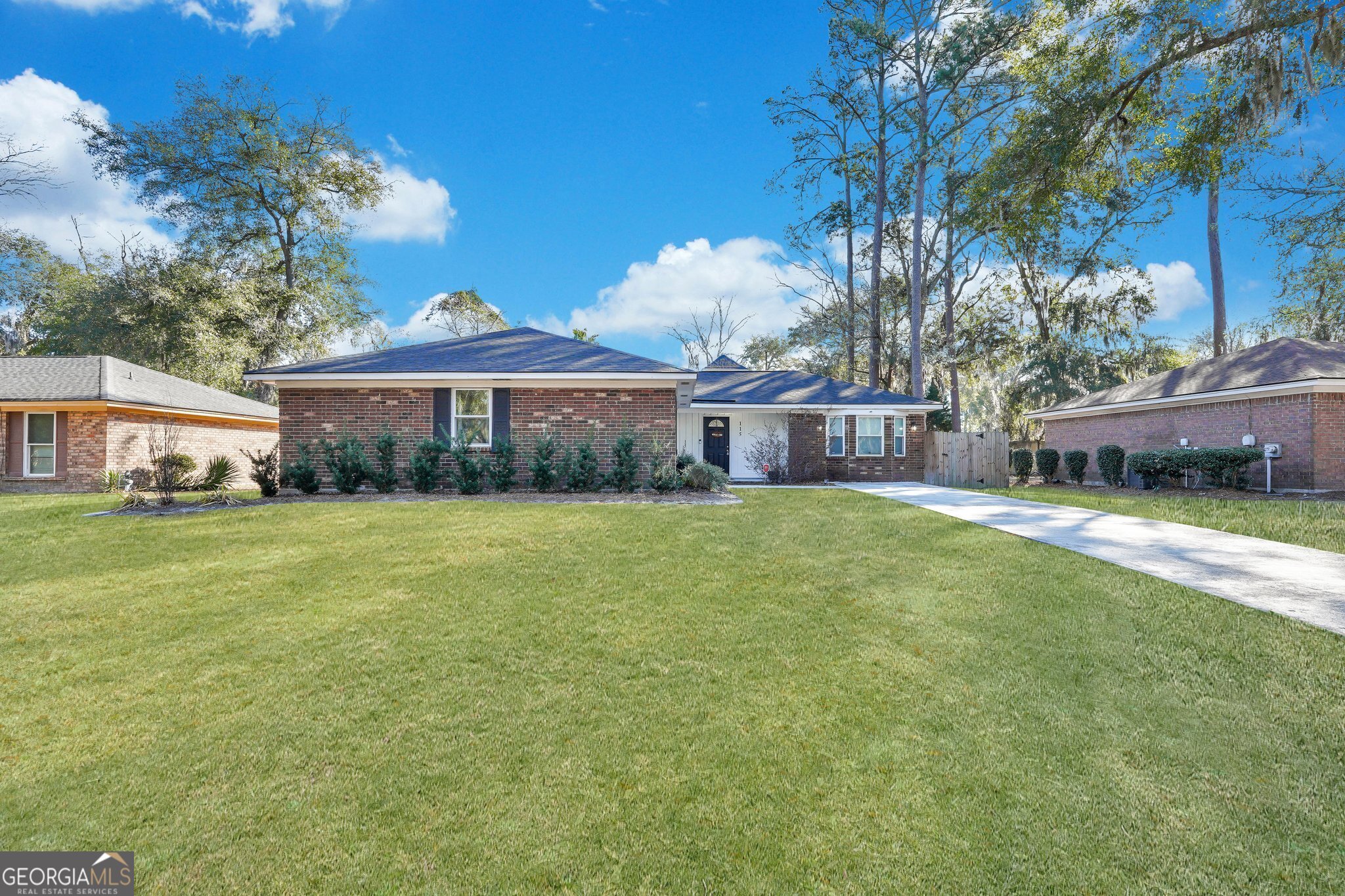 115 Runaway Point Road Savannah, GA 31404 - Photo 1 of 1 a front view of a house with garden