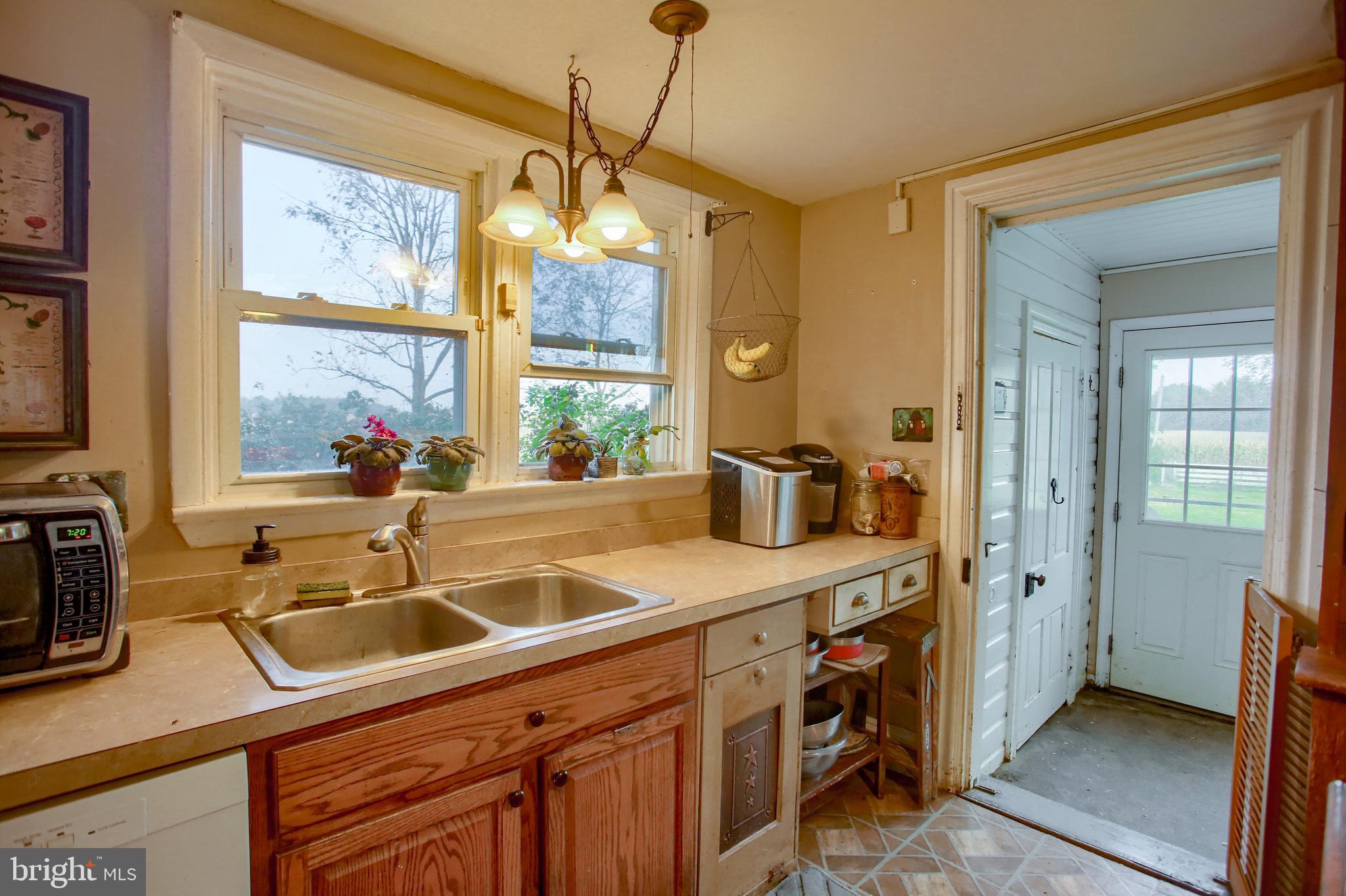 303 South Ridge Road Carlisle, PA 17015 - Photo 13 of 47 Kitchen leading to laundry room rear porch