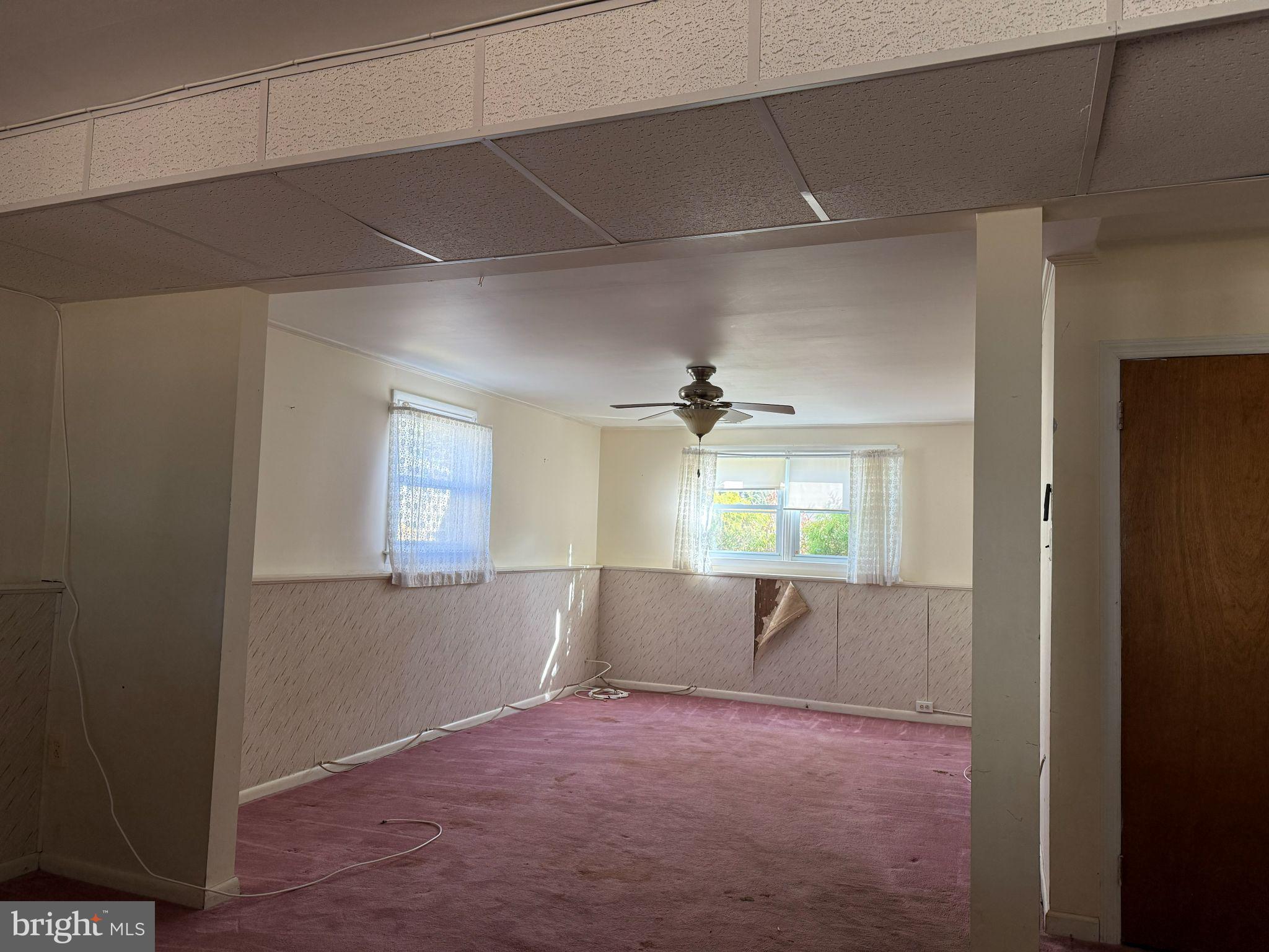 916 Edgemoor Road Cherry Hill, NJ 08034 - Photo 19 of 33 a view of empty room with wooden floor and windows