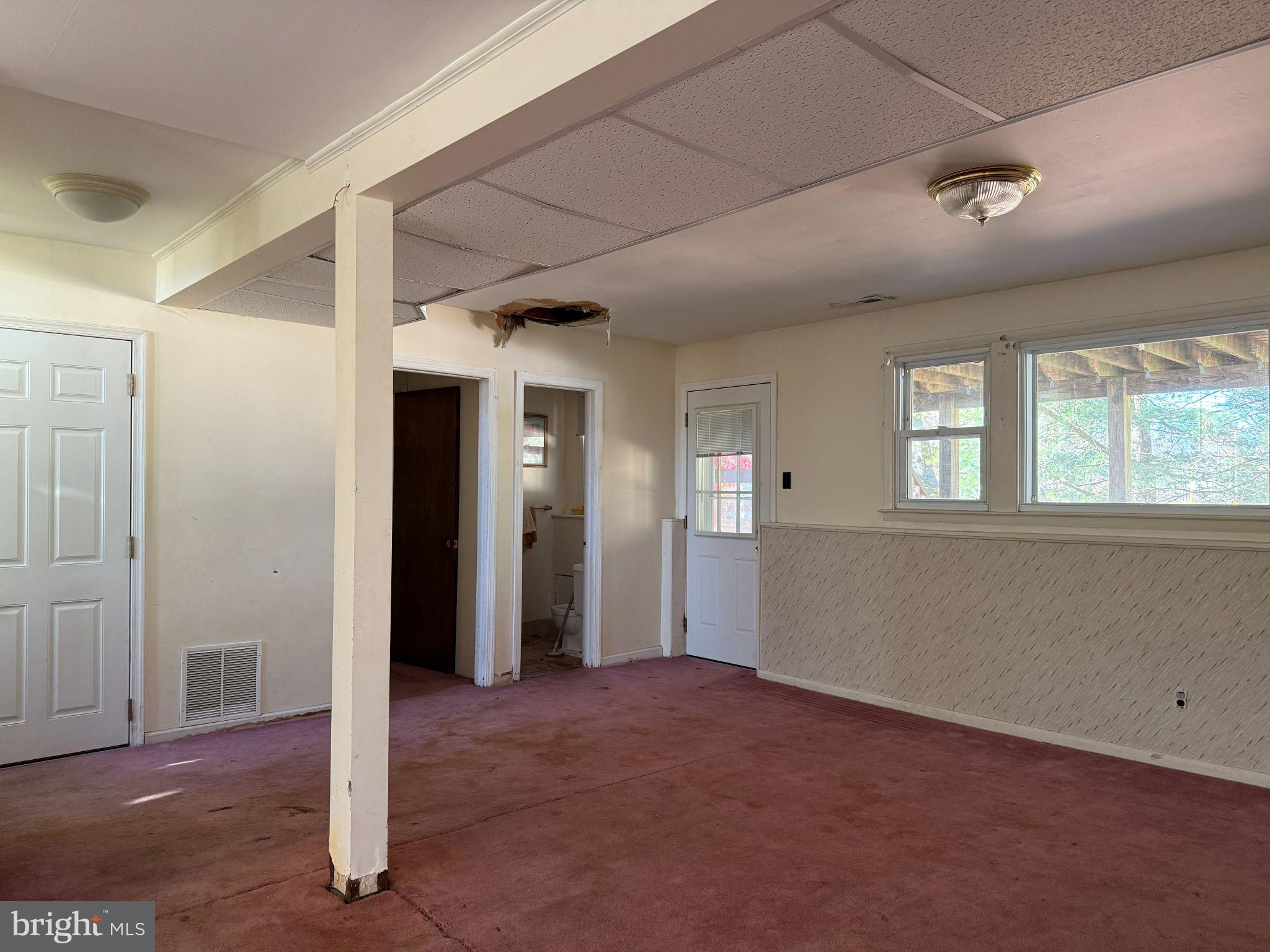 916 Edgemoor Road Cherry Hill, NJ 08034 - Photo 21 of 33 a view of a hallway with bathroom and front door