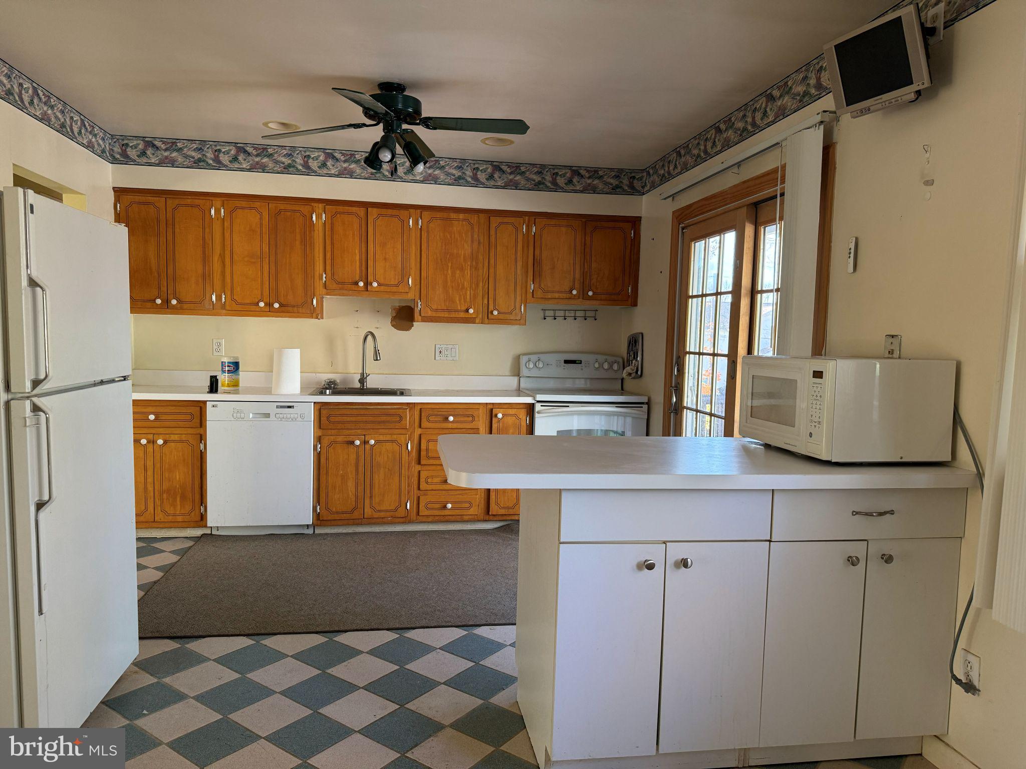 916 Edgemoor Road Cherry Hill, NJ 08034 - Photo 7 of 33 a kitchen with stainless steel appliances a cabinets and a counter top space