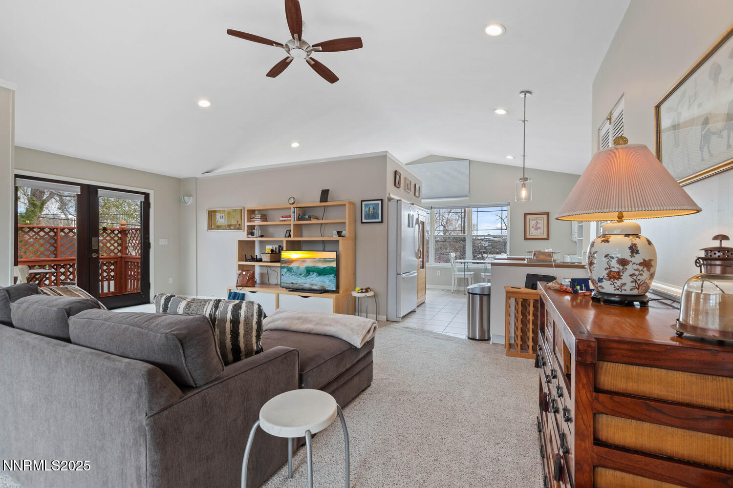 543 California Avenue Reno, NV 89509 - Photo 1 of 17 a living room with furniture a fireplace and a chandelier