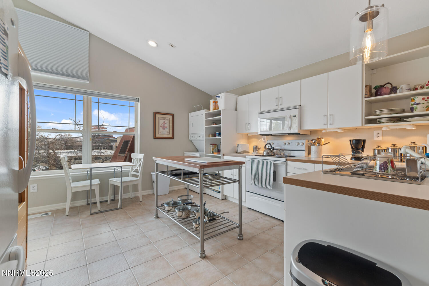 543 California Avenue Reno, NV 89509 - Photo 3 of 17 a kitchen with appliances a sink and cabinets
