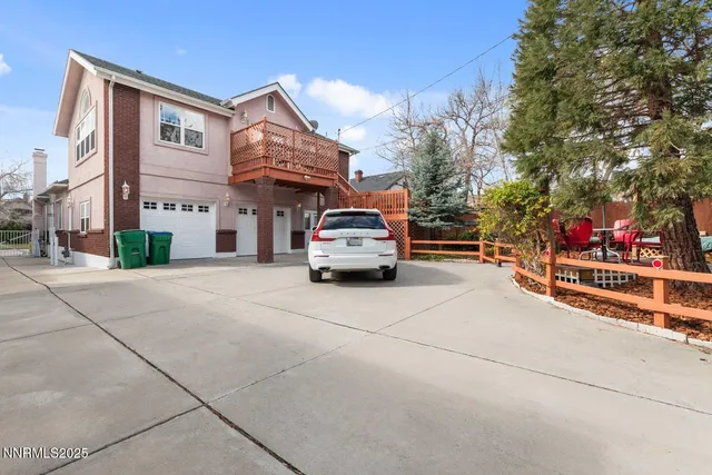 a car parked in front of a house