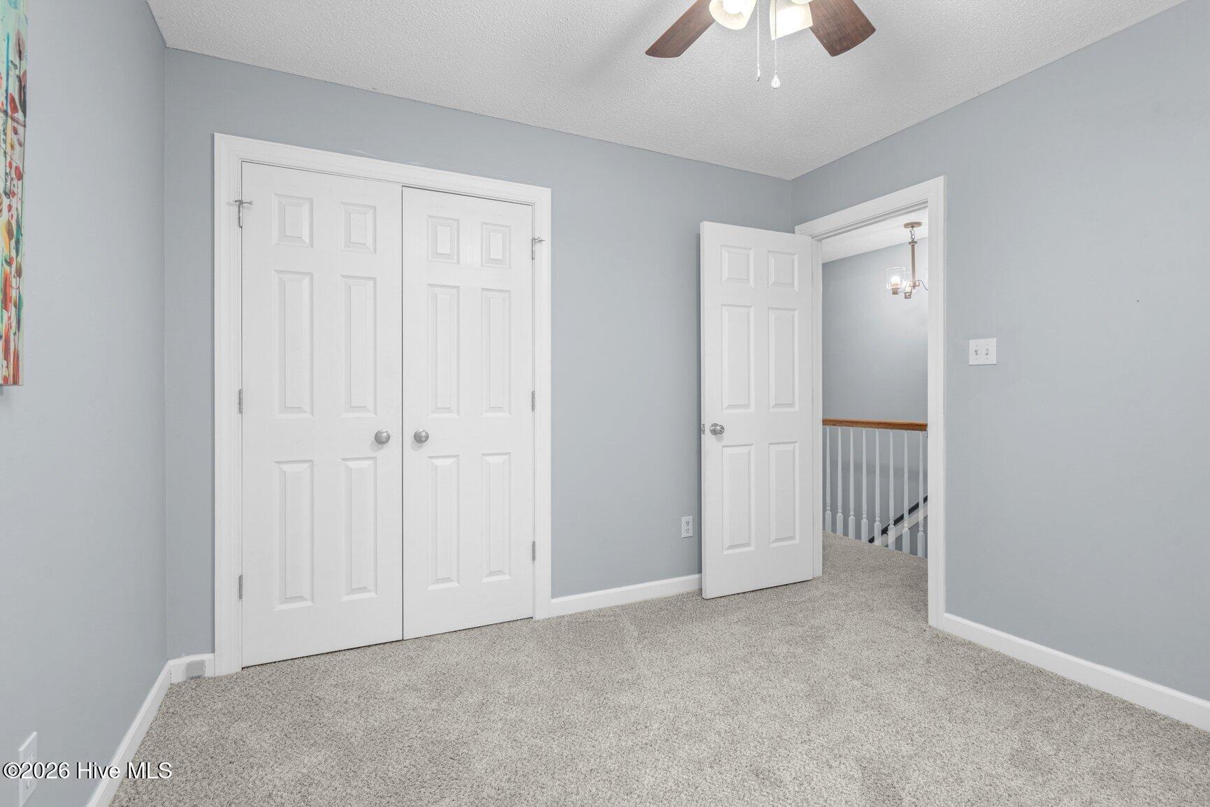 1732 Acorn Ridge Road Rocky Mount, NC 27804 - Photo 18 of 32 Double Door Closet Bedroom 2