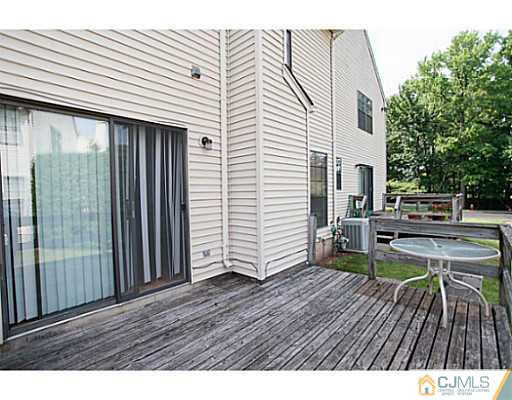 302 Timber Oaks Road Edison, NJ 08820 - Photo 16 of 16 a view of outdoor kitchen with seating space