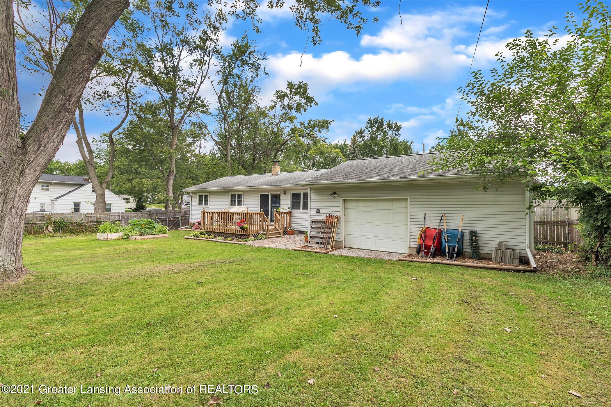 1327 Pierce Road Lansing, MI 48910 - Photo 34 of 34 Backyard to Garage