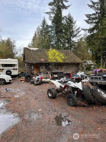 a view of street with parked cars