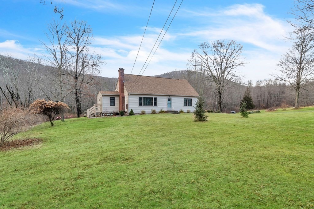 434 Chapin Road Hampden, MA 01036 - Photo 2 of 42 a front view of house with garden