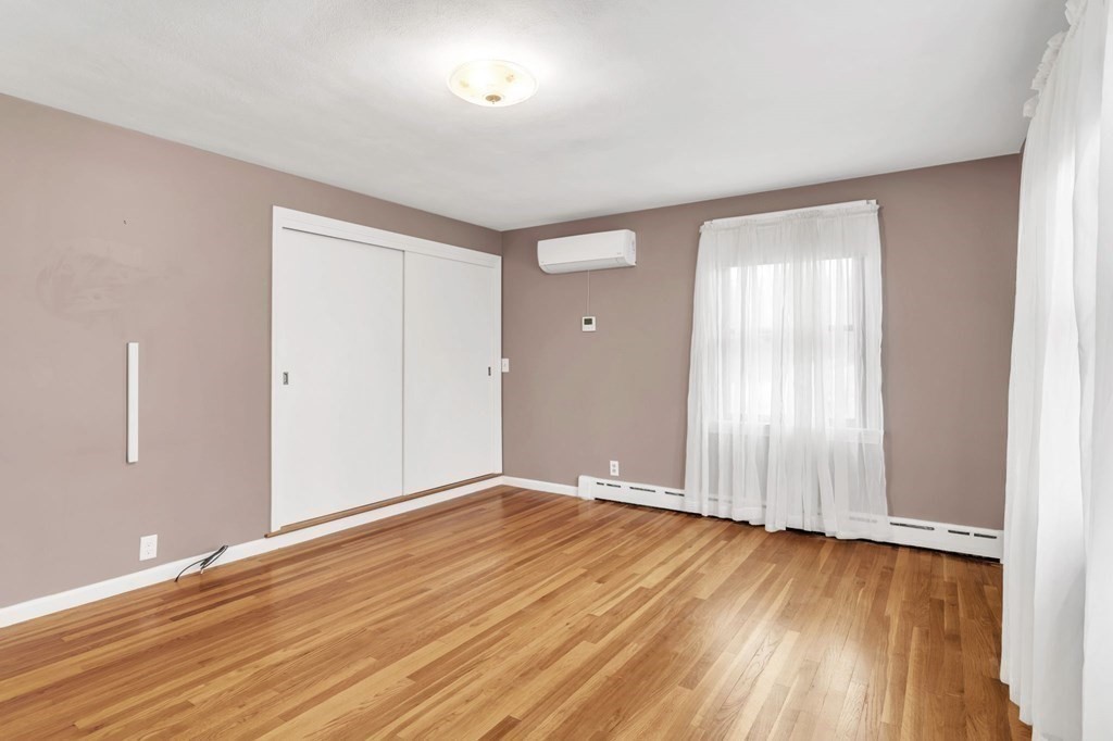 434 Chapin Road Hampden, MA 01036 - Photo 26 of 42 a view of an empty room with wooden floor and a window