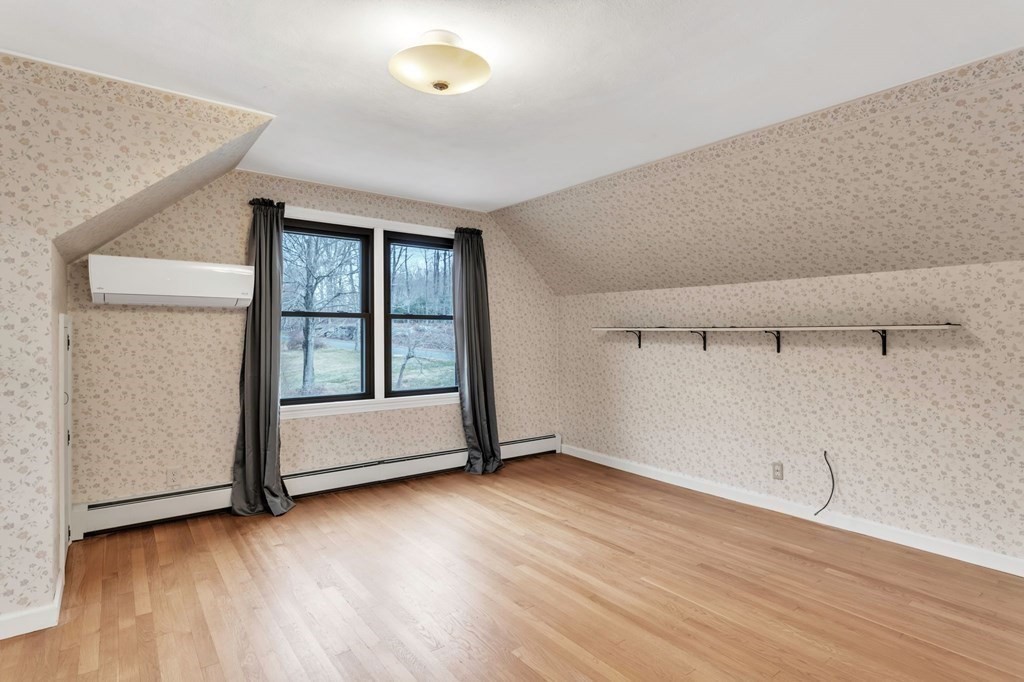 434 Chapin Road Hampden, MA 01036 - Photo 29 of 42 an empty room with wooden floor and windows