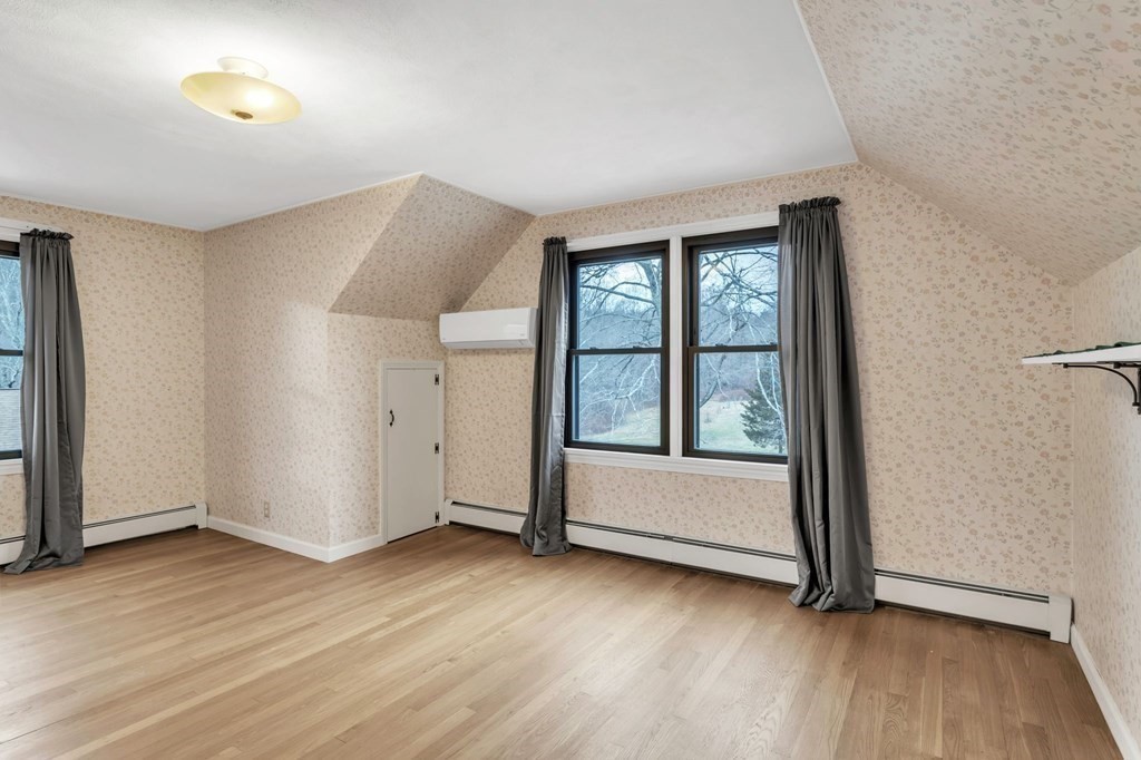 434 Chapin Road Hampden, MA 01036 - Photo 30 of 42 an empty room with wooden floor and windows