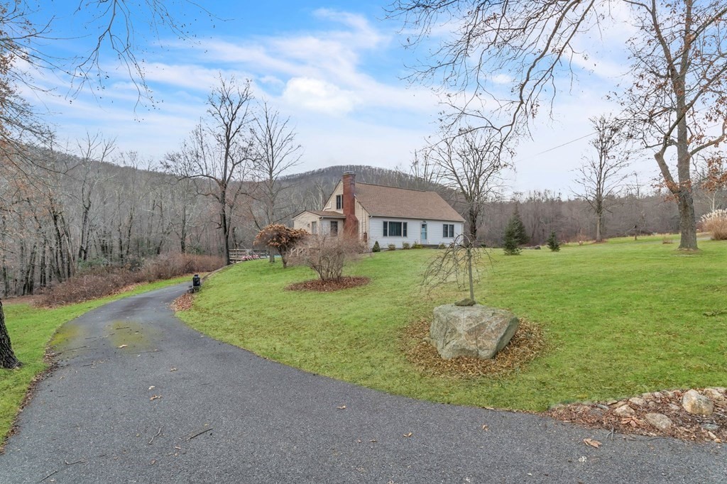 434 Chapin Road Hampden, MA 01036 - Photo 4 of 42 a view of a garden with a slide