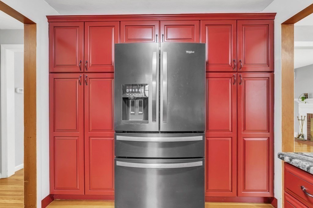 434 Chapin Road Hampden, MA 01036 - Photo 7 of 42 a kitchen with stainless steel appliances wooden cabinets and a refrigerator