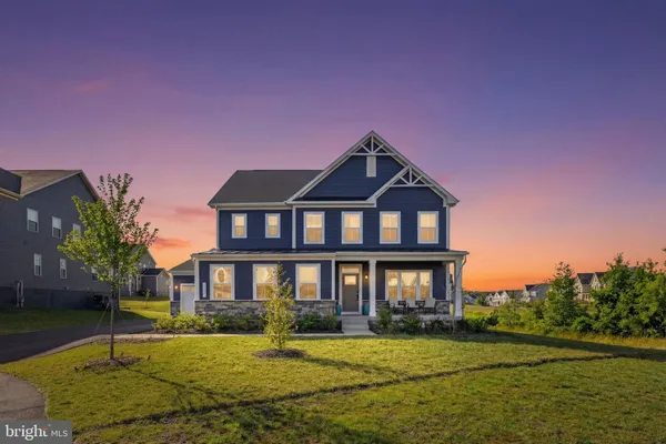 a view of a swimming pool with seating area