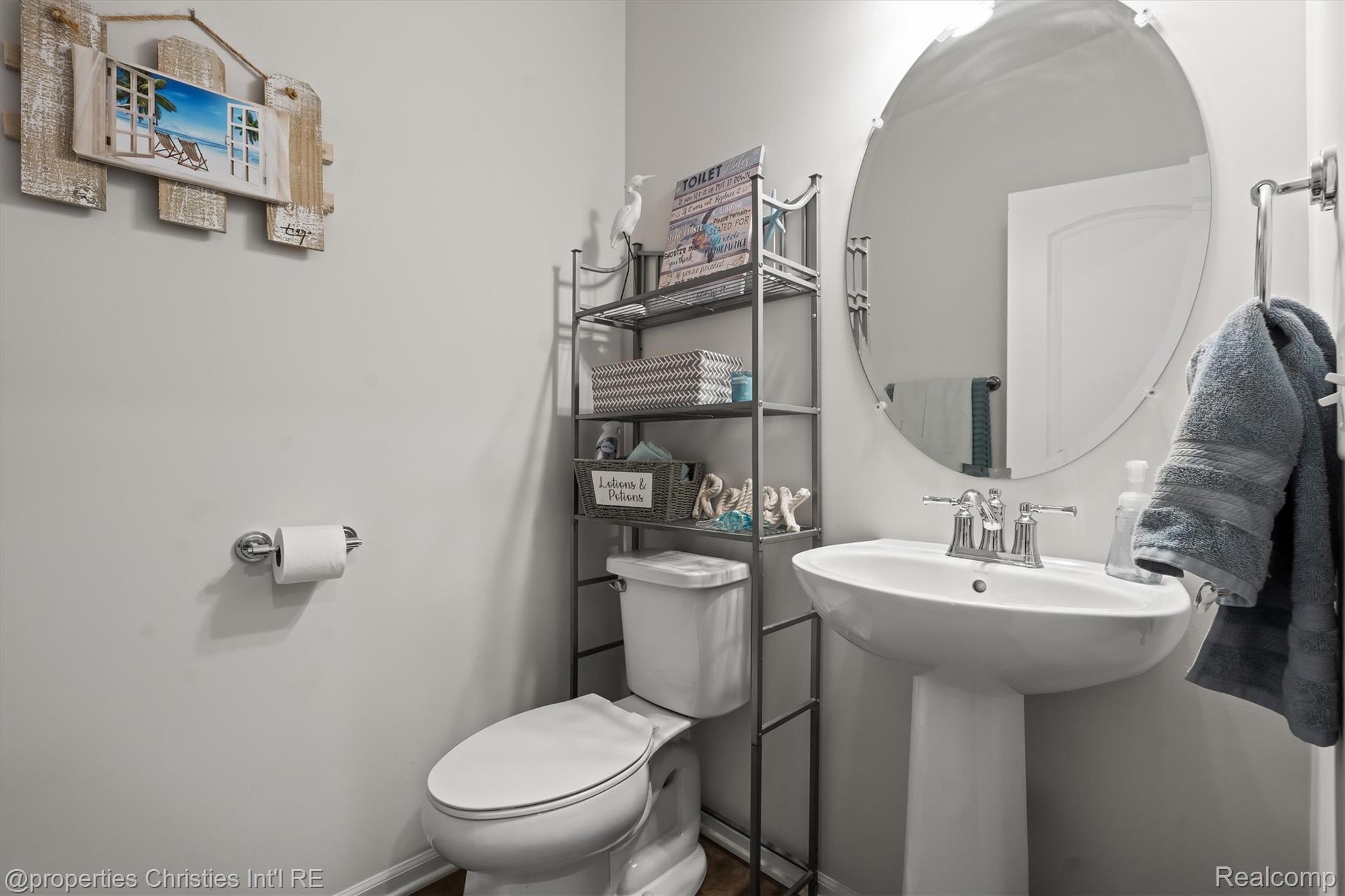 2721 Maize Loop Saline, MI 48176 - Photo 16 of 52 Bathroom featuring toilet and baseboards