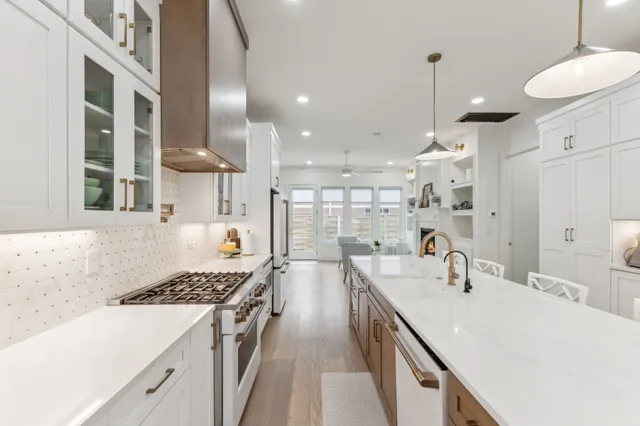 a bedroom with a bed and a television