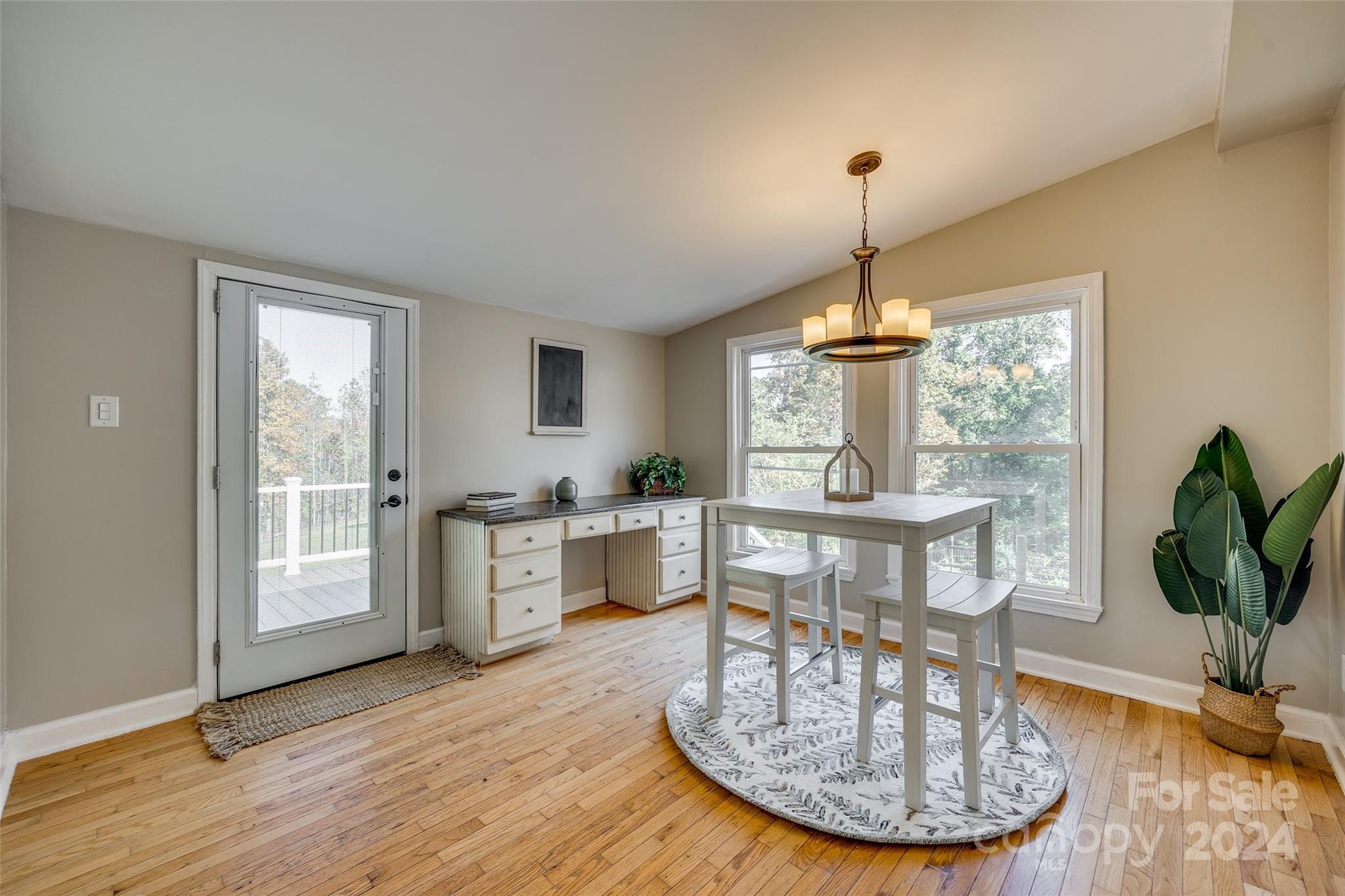 3110 Bush Road Clover, SC 29710 - Photo 11 of 48 a view of a dining room with furniture window and wooden floor