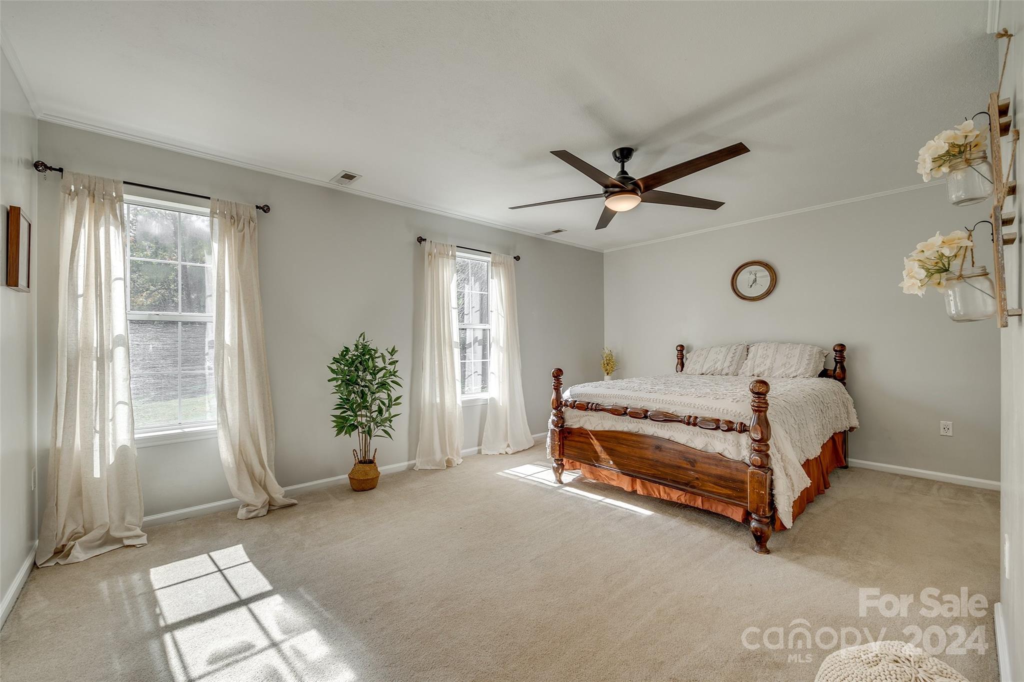 3110 Bush Road Clover, SC 29710 - Photo 16 of 48 a bed room with a bed and a ceiling fan