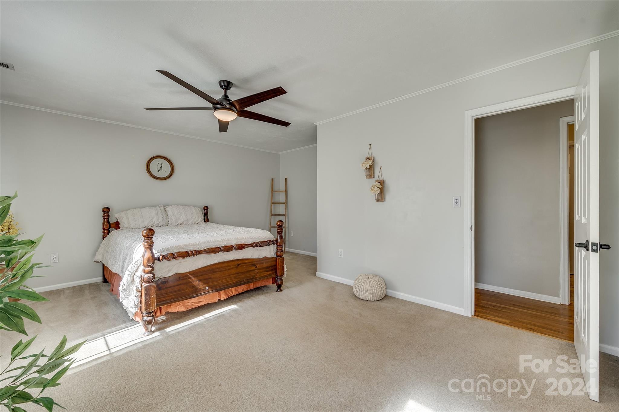 3110 Bush Road Clover, SC 29710 - Photo 17 of 48 a bedroom with a bed and a ceiling fan
