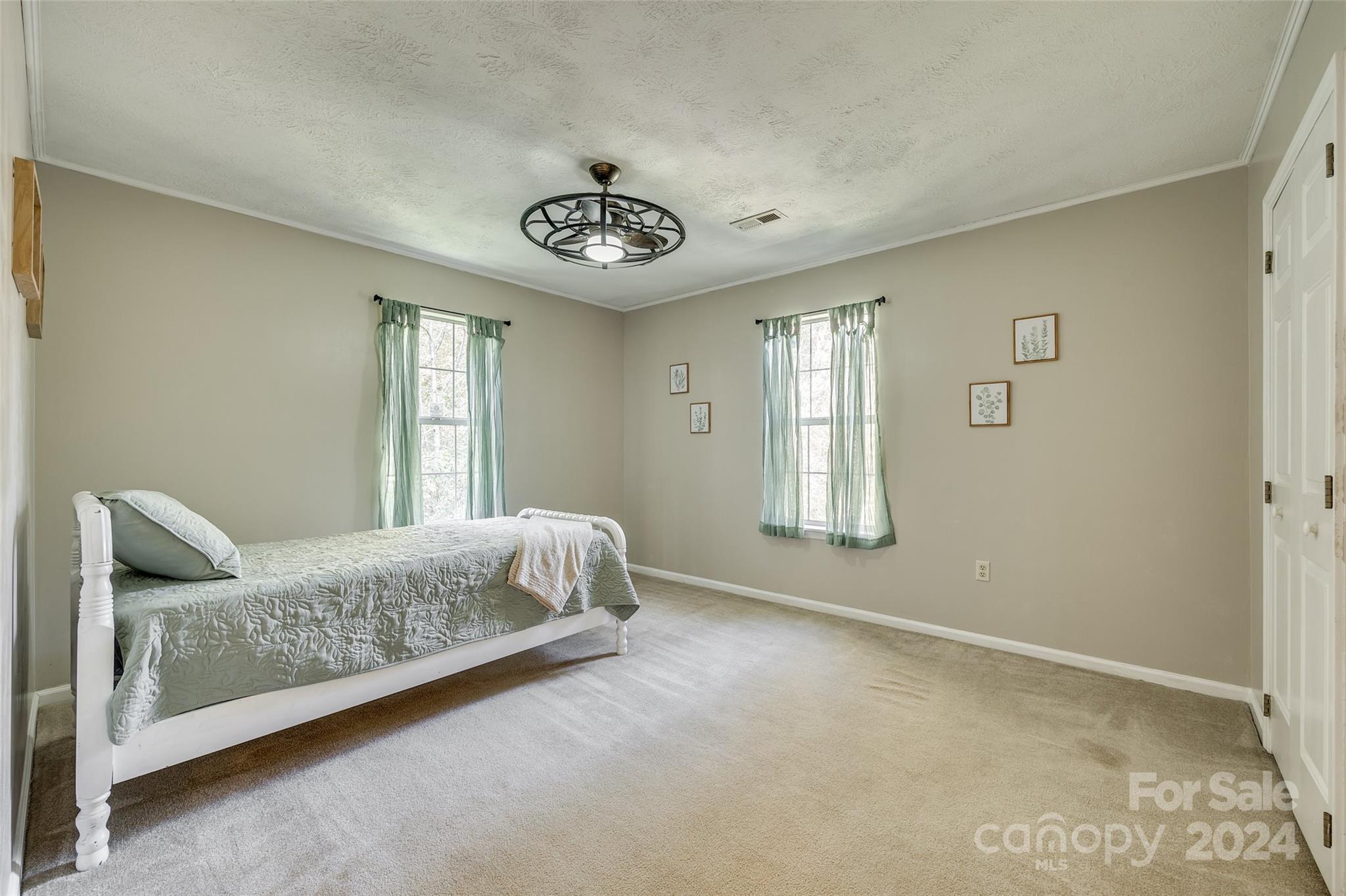 3110 Bush Road Clover, SC 29710 - Photo 21 of 48 a bedroom with a bed and window