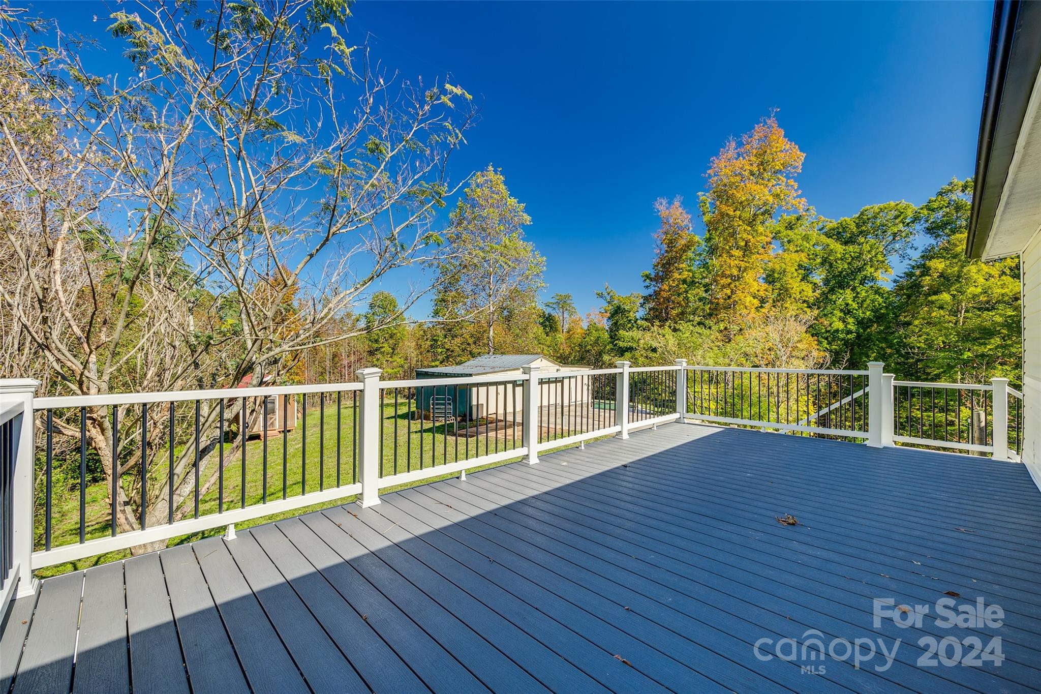 3110 Bush Road Clover, SC 29710 - Photo 26 of 48 a view of a balcony with wooden floor and fence