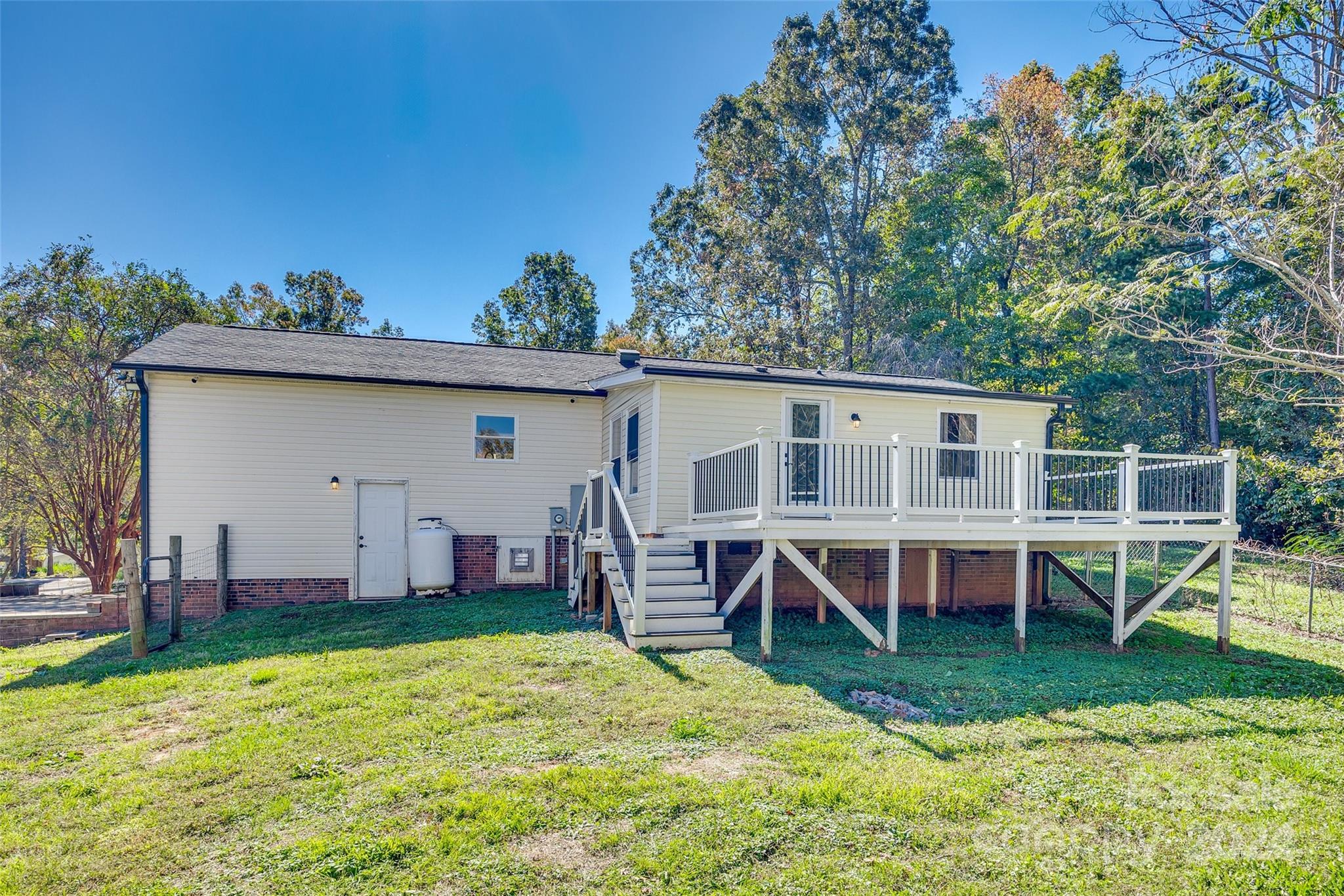 3110 Bush Road Clover, SC 29710 - Photo 27 of 48 a view of a house with a backyard