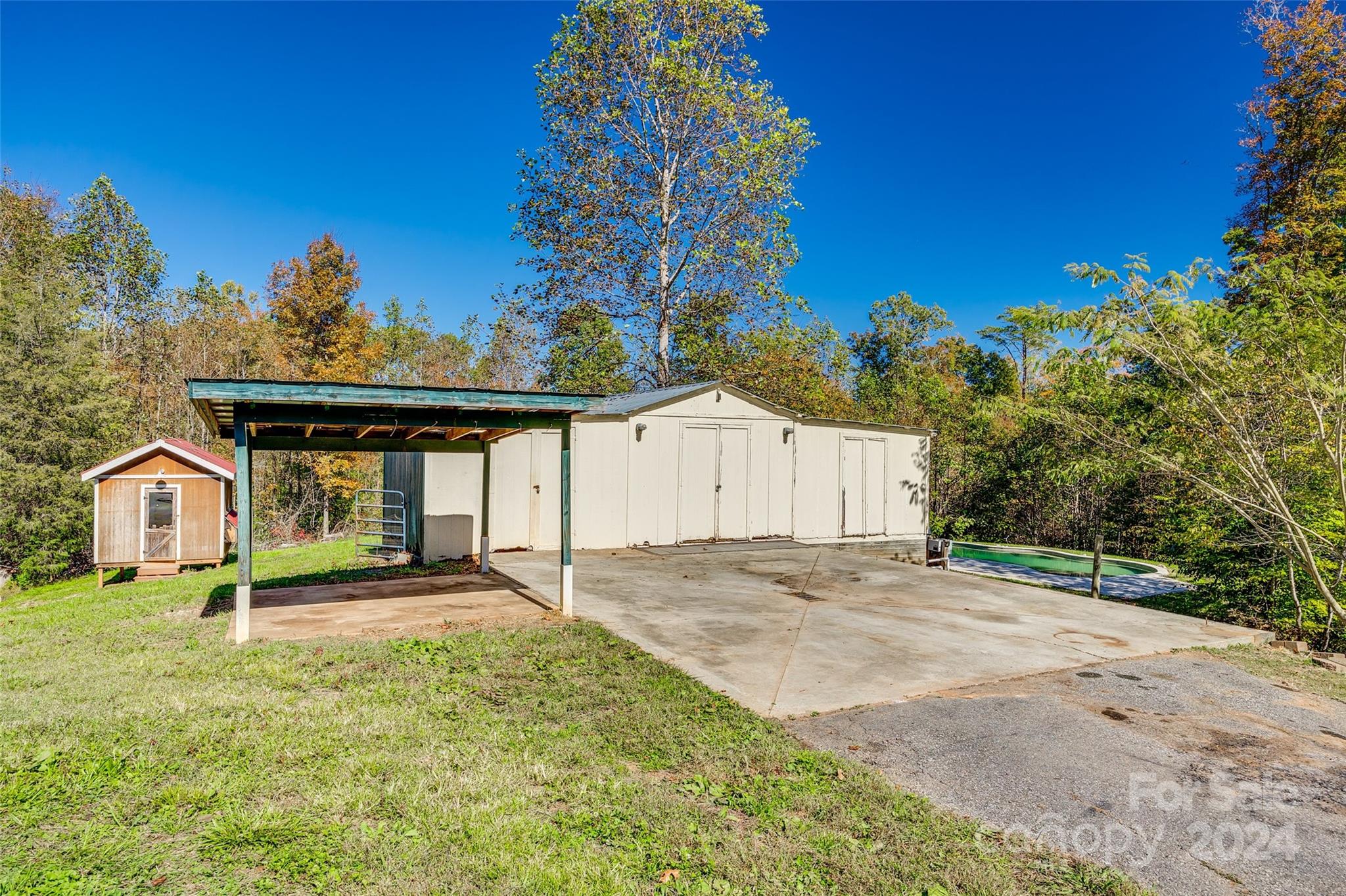 3110 Bush Road Clover, SC 29710 - Photo 28 of 48 a front view of a house with a yard and garage