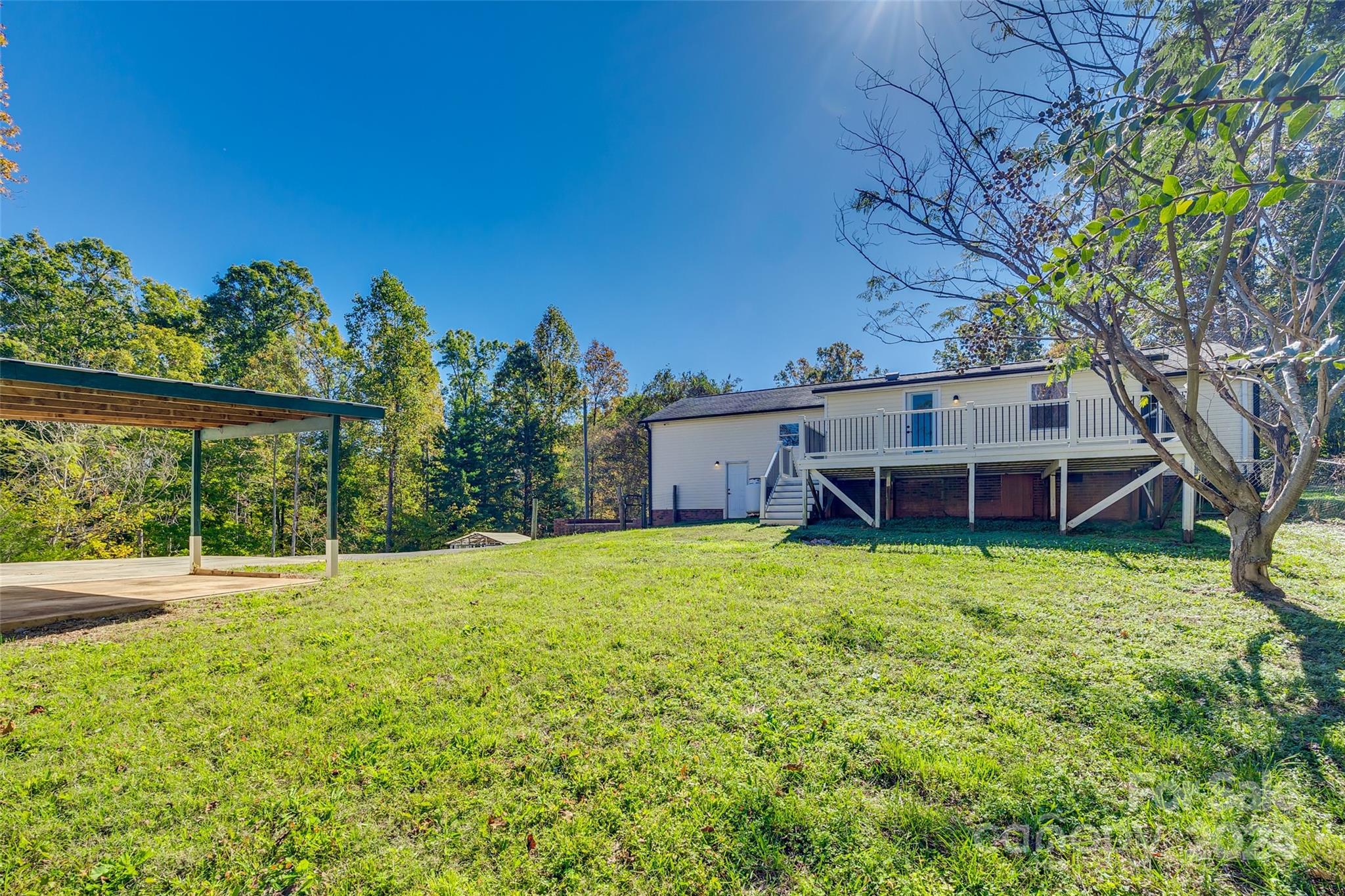 3110 Bush Road Clover, SC 29710 - Photo 29 of 48 a house with trees in the background