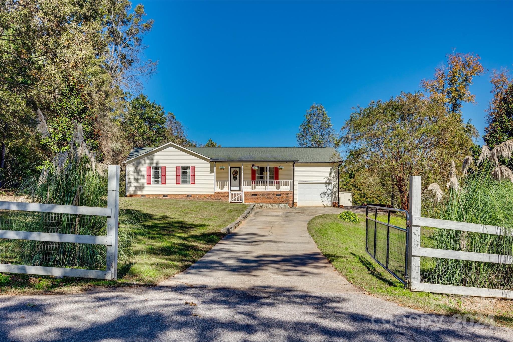 3110 Bush Road Clover, SC 29710 - Photo 35 of 48 a front view of a house with a yard