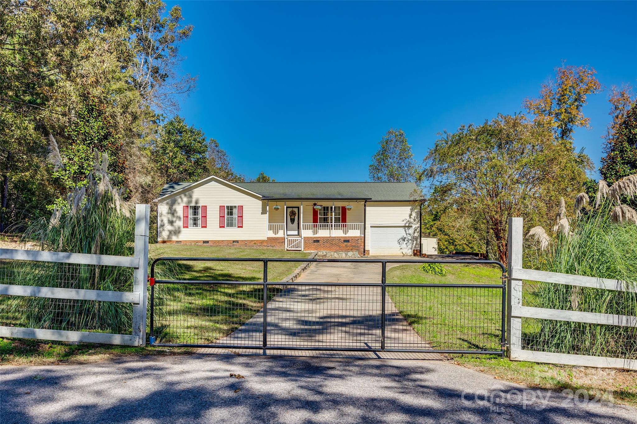 3110 Bush Road Clover, SC 29710 - Photo 36 of 48 a front view of a house with a yard