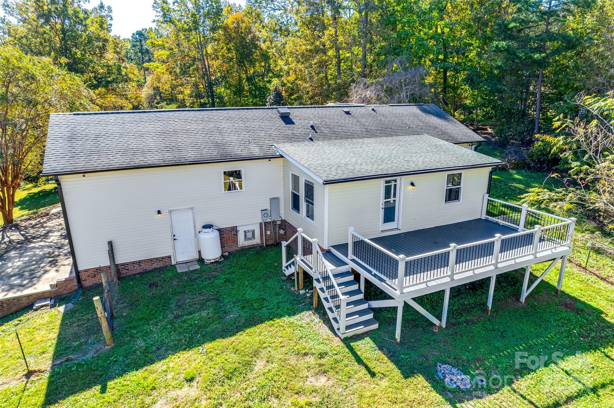 3110 Bush Road Clover, SC 29710 - Photo 39 of 48 an aerial view of a house with swimming pool and a yard