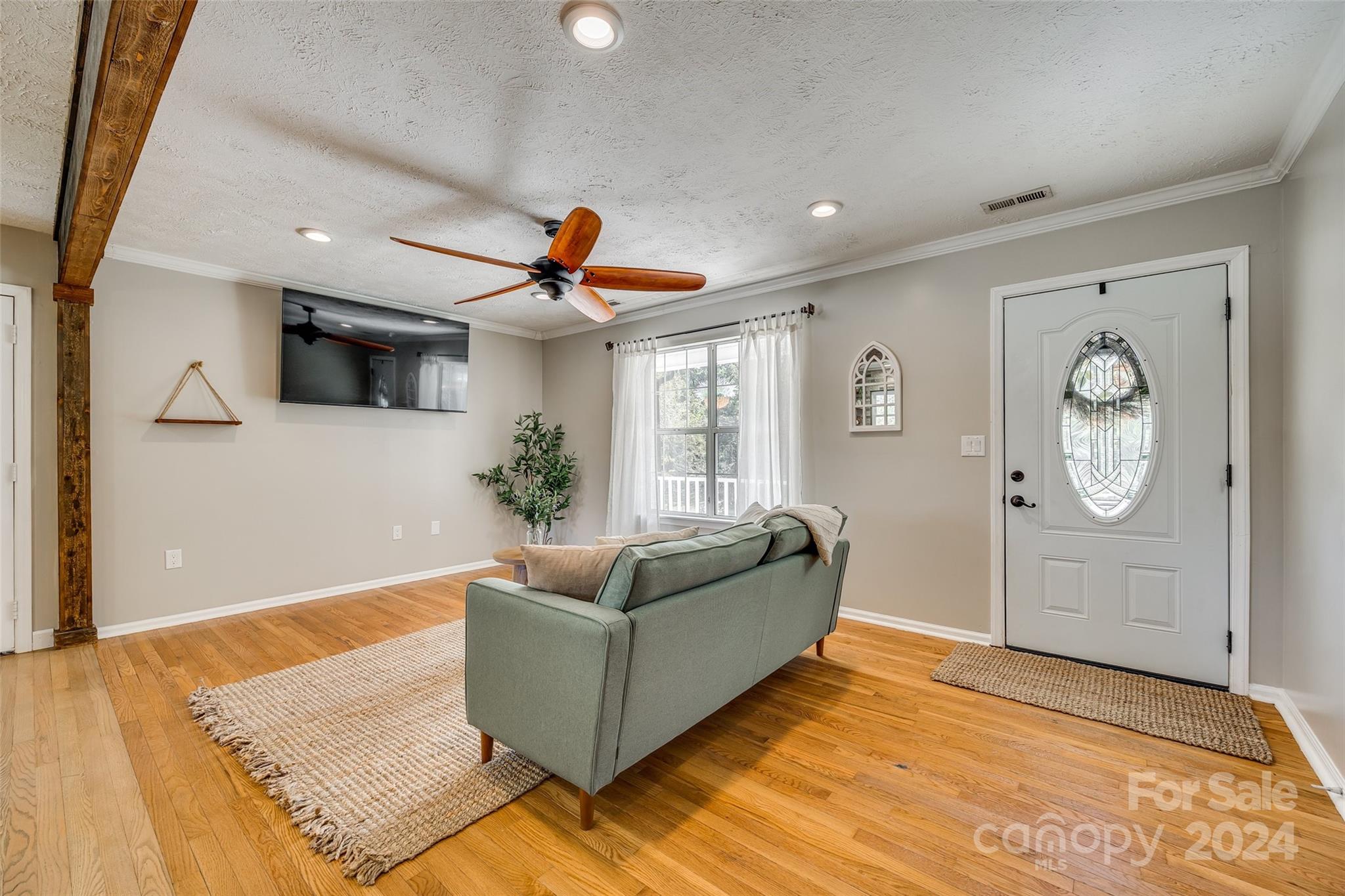 3110 Bush Road Clover, SC 29710 - Photo 4 of 48 a living room with furniture and a flat screen tv