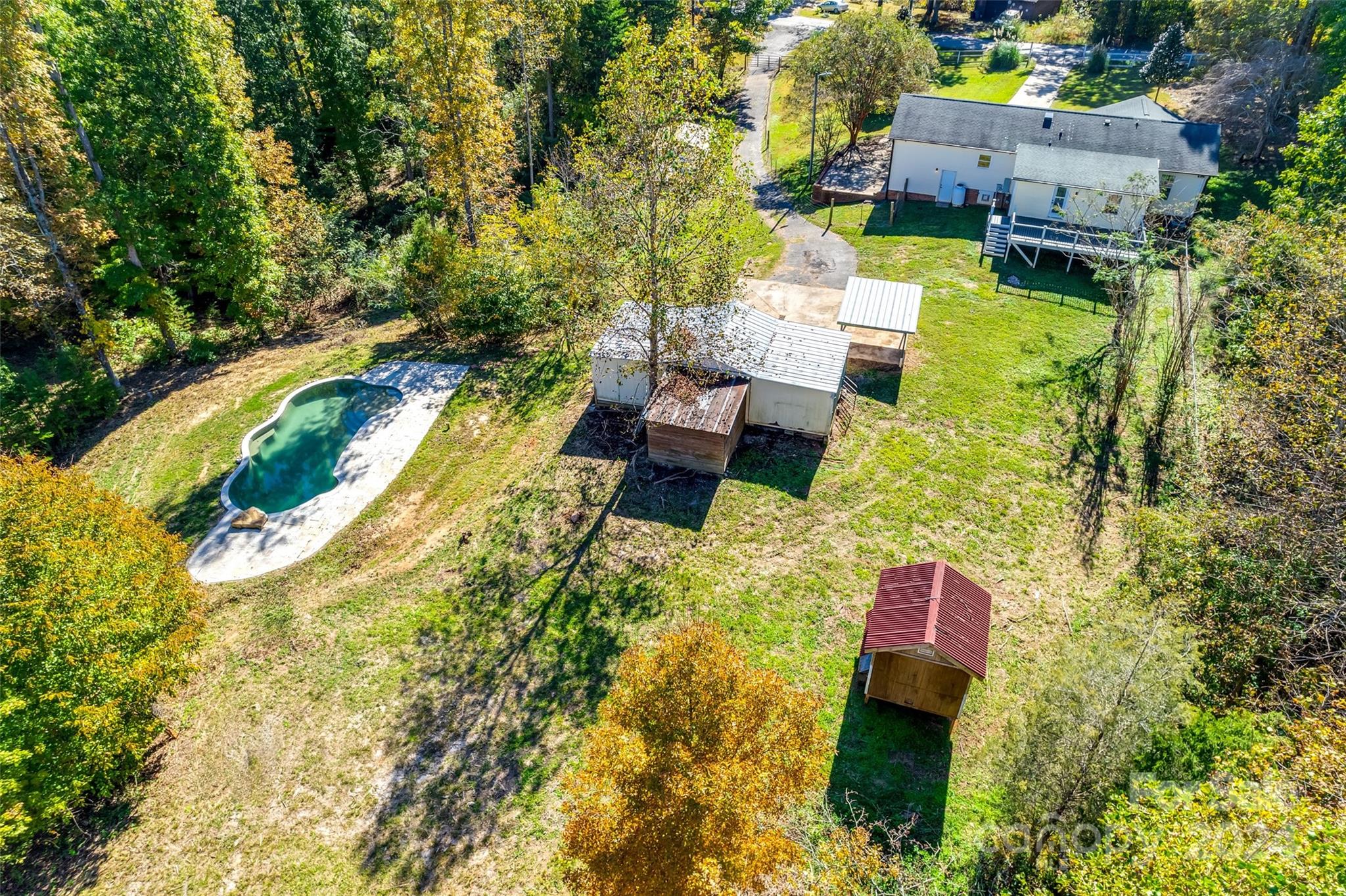 3110 Bush Road Clover, SC 29710 - Photo 41 of 48 an aerial view of a house with swimming pool and large trees
