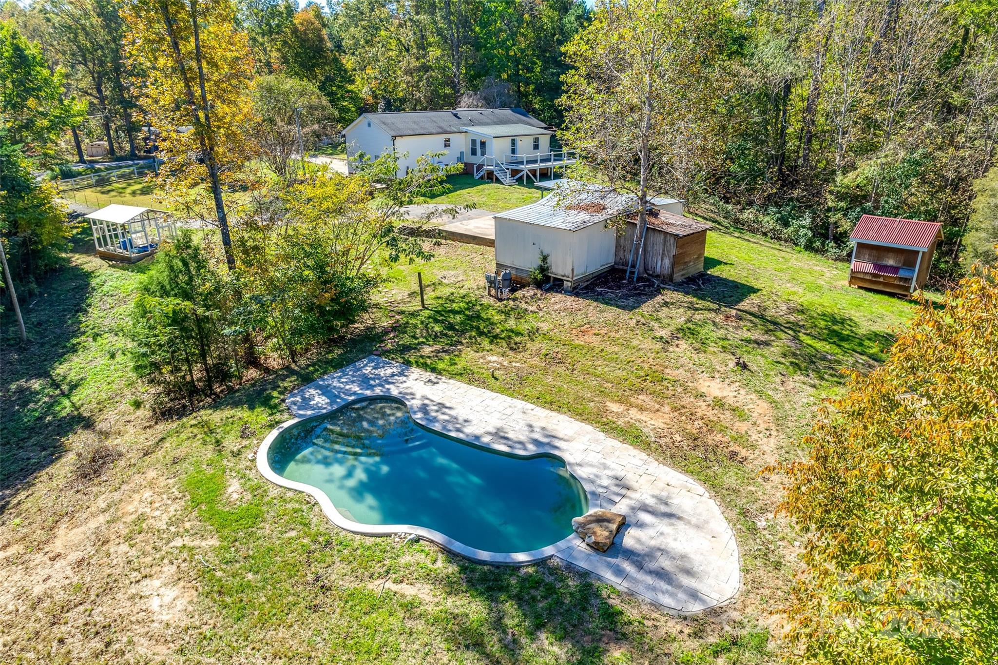 3110 Bush Road Clover, SC 29710 - Photo 43 of 48 a swimming pool with a yard and outdoor seating