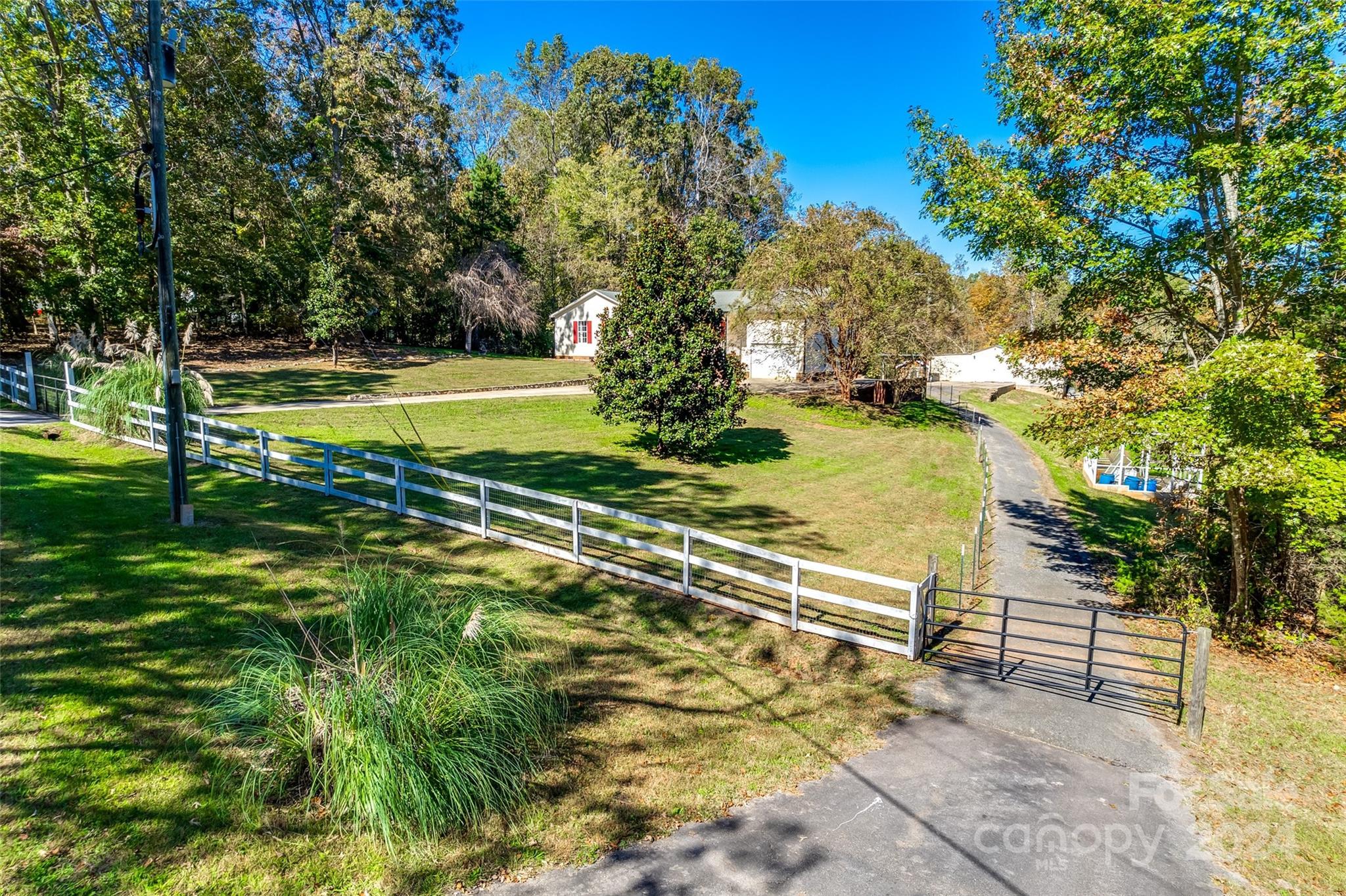 3110 Bush Road Clover, SC 29710 - Photo 45 of 48 a view of a swimming pool with a yard