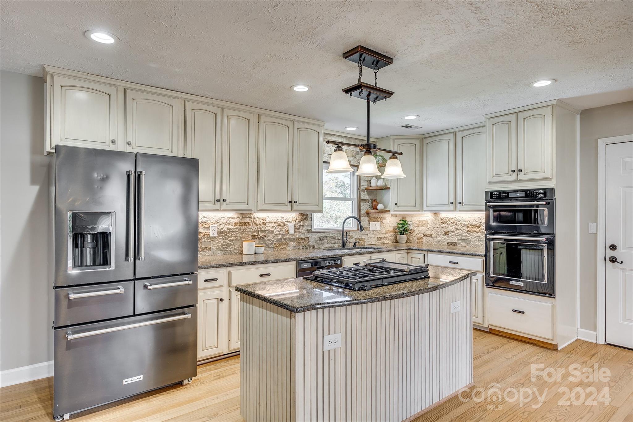 3110 Bush Road Clover, SC 29710 - Photo 6 of 48 a kitchen with stainless steel appliances granite countertop a refrigerator a stove a sink and a refrigerator