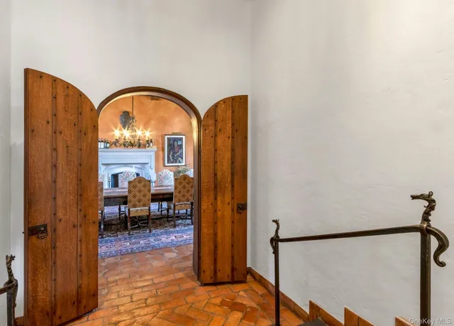 a view of a livingroom with furniture window and wooden floor