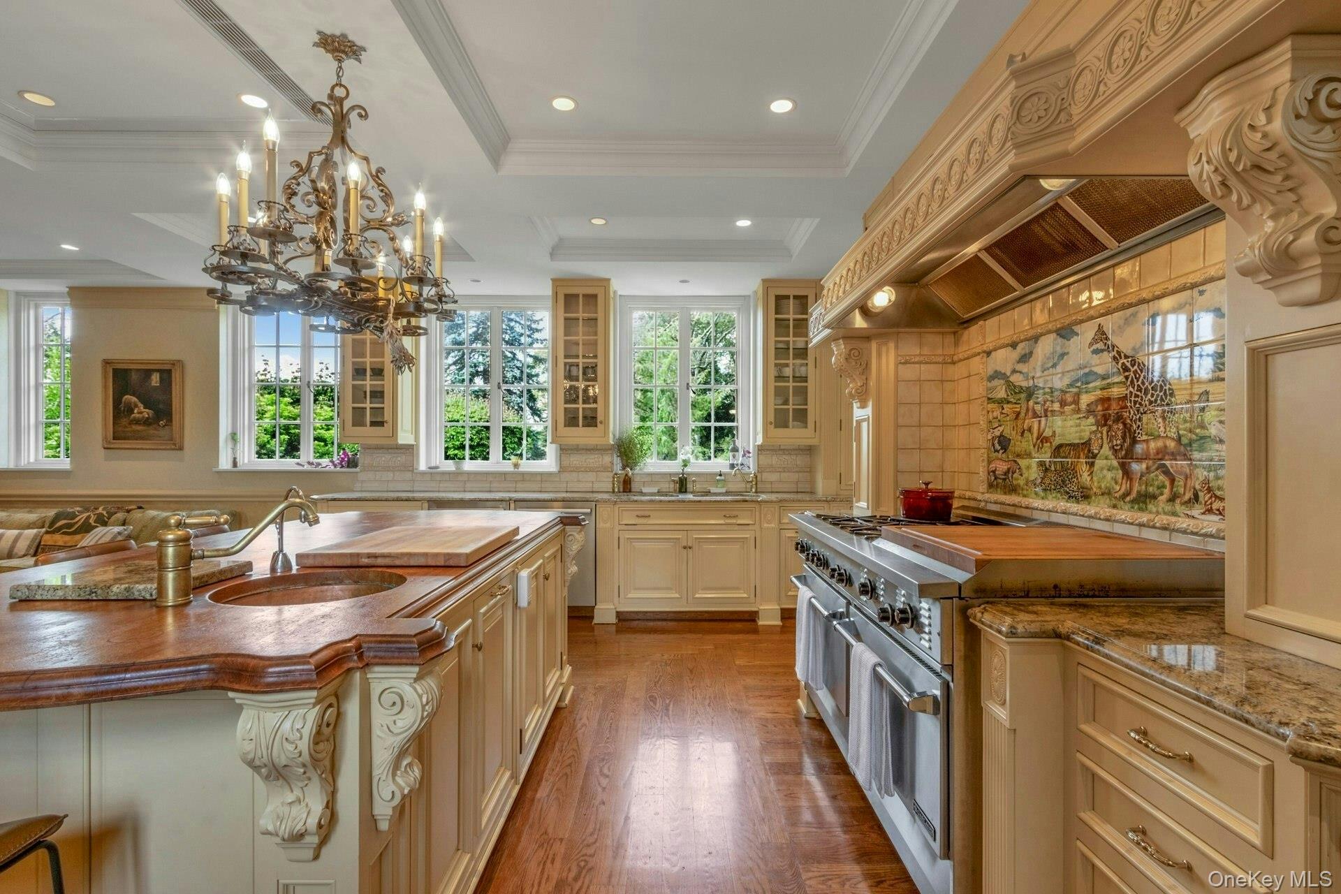120 Ridge Road Tuxedo Park, NY 10987 - Photo 18 of 50 a kitchen with stainless steel appliances granite countertop a sink and a stove