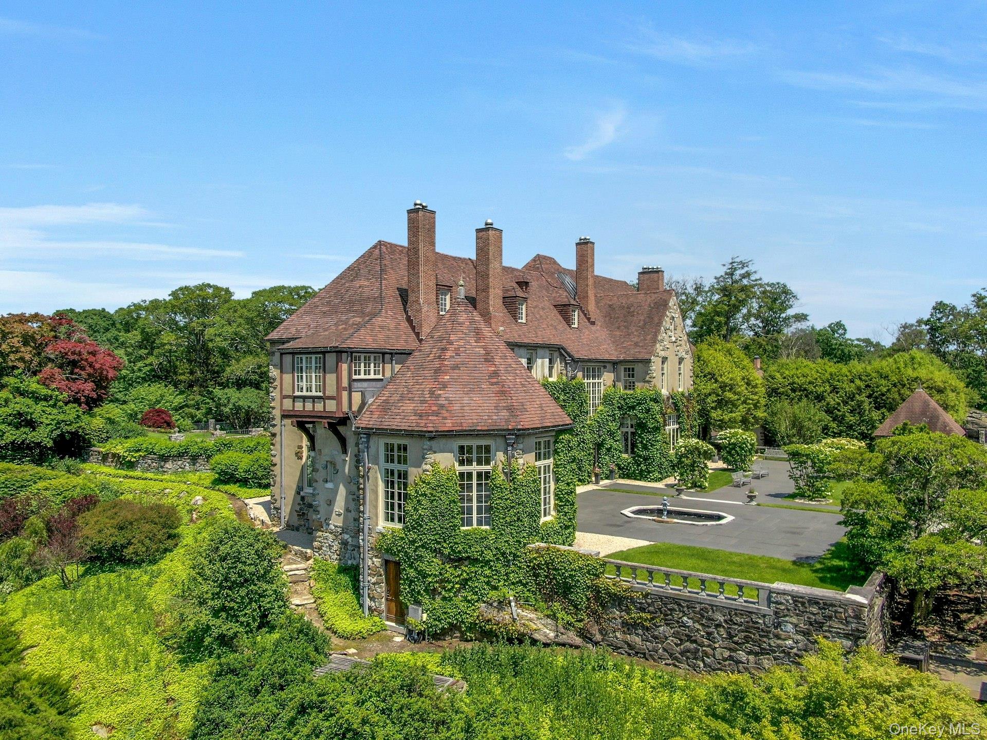120 Ridge Road Tuxedo Park, NY 10987 - Photo 2 of 50 a view of a house with a yard and balcony
